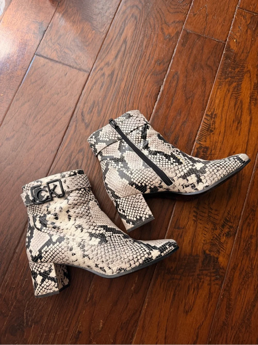 Calvin Klein Black & Ivory Snakeskin-Print Ankle Booties
